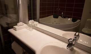 Отель Hotel Rukatonttu Рука Улучшенный двухместный номер с 2 отдельными кроватями-10