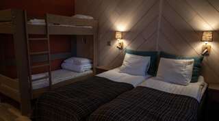 Отель Hotel Rukatonttu Рука Улучшенный семейный номер-23