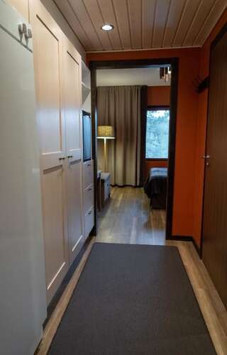 Отель Hotel Rukatonttu Рука Улучшенный семейный номер-32